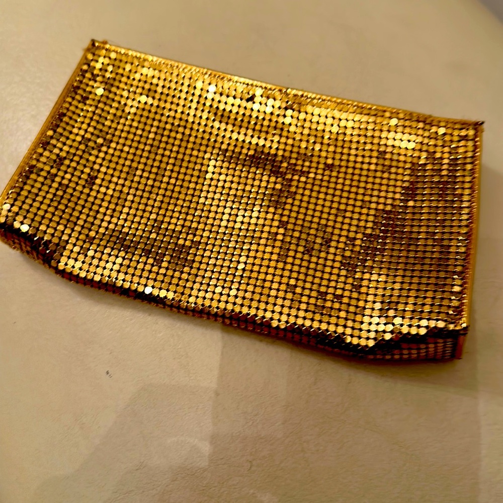 Vintage, sequin, metallic coin, purse, or make up bag.